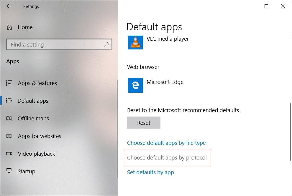 Click on Choose default apps by protocol at the bottom
