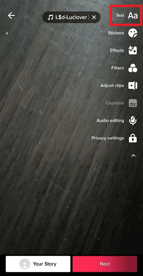 tap on the Aa text icon 