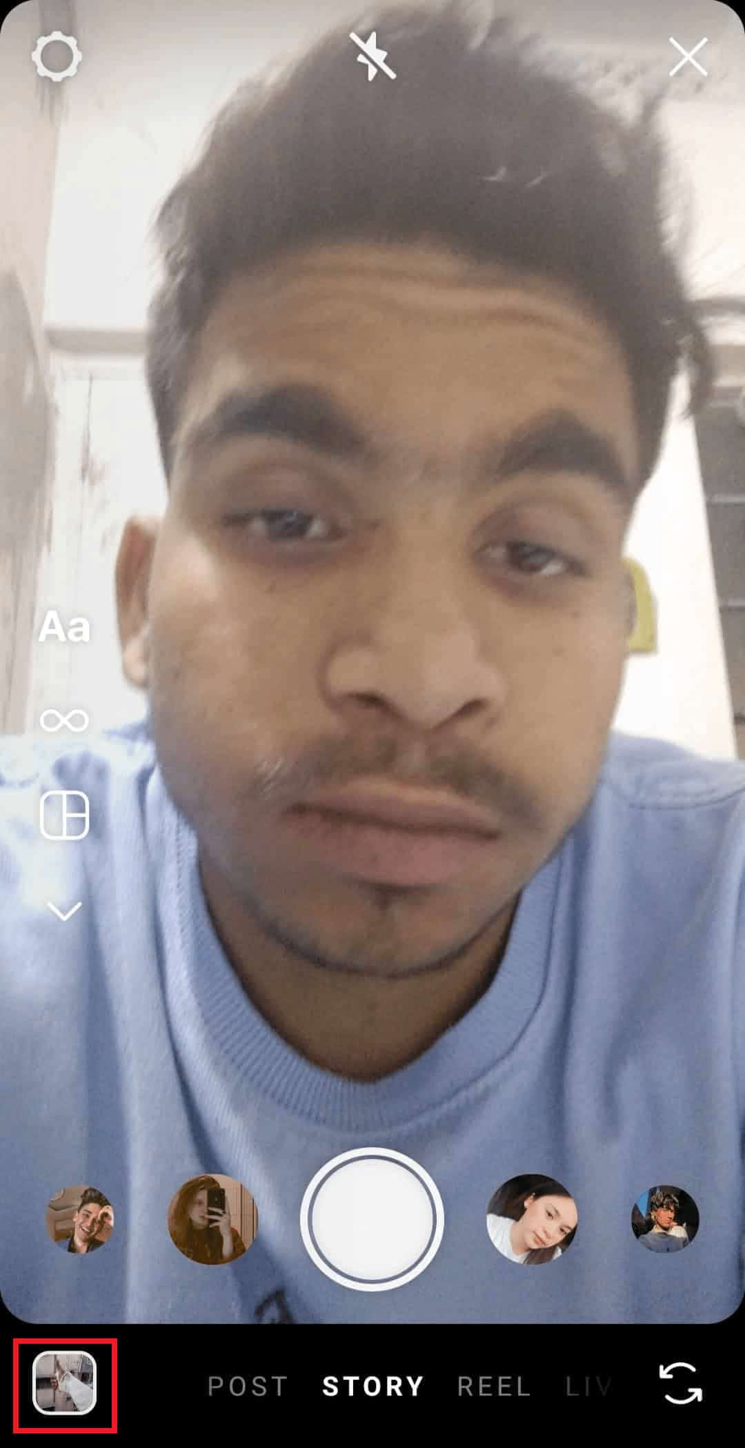 Tap on the photo thumbnail icon from the bottom left corner