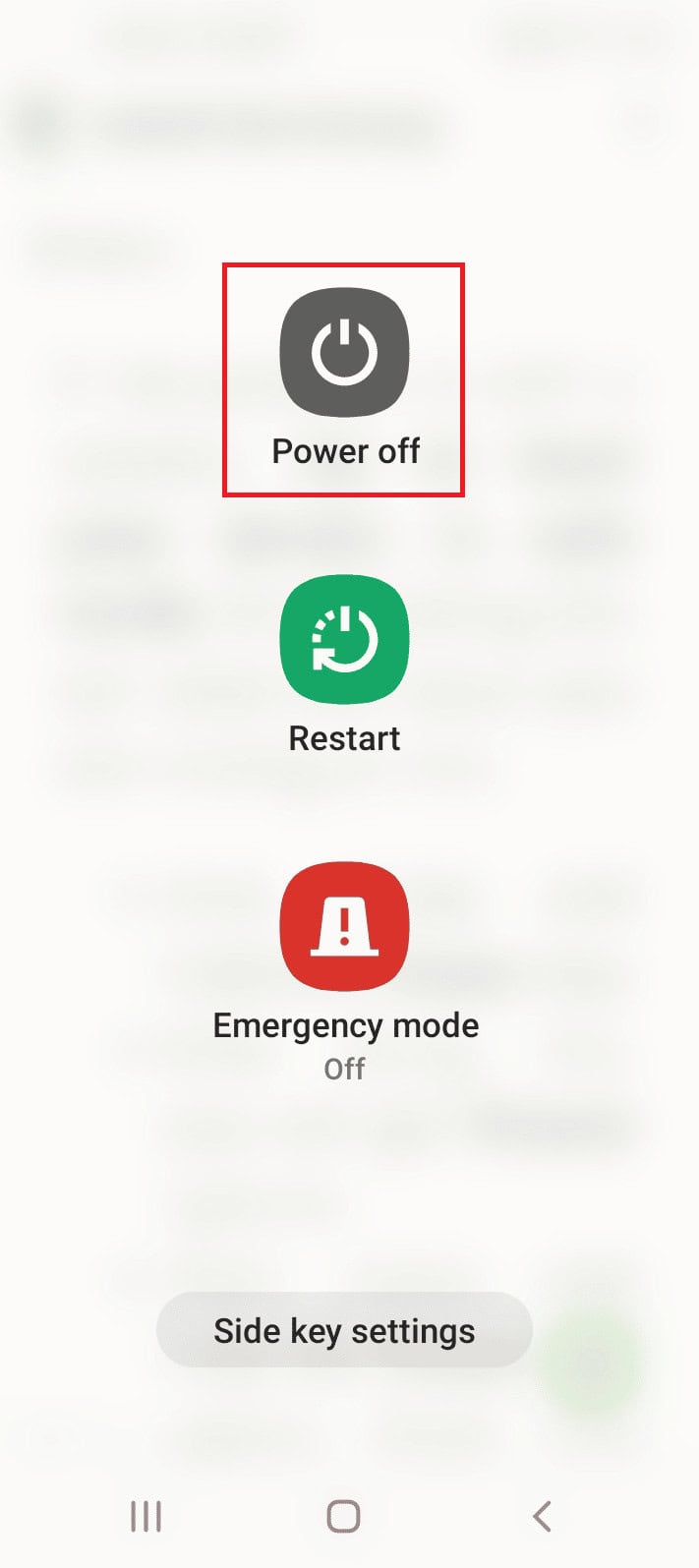 Long press the power button at the side and long tap on the Power off option