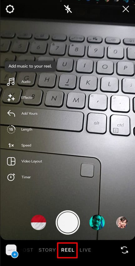 Tap on the Reel option from the menu at the bottom of the screen.